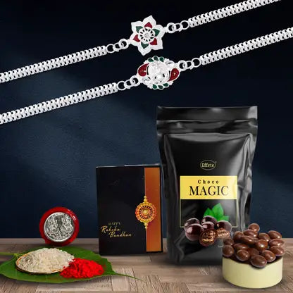 Rakhi Gift Combo With 2 Elegant Rakhis For Brother  Includes Choco Magic Pack Silver Coin Roli Chawal  Greeting Card